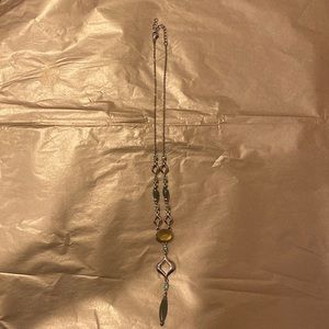 Drop pendant gold tone necklace with green and yellow beads